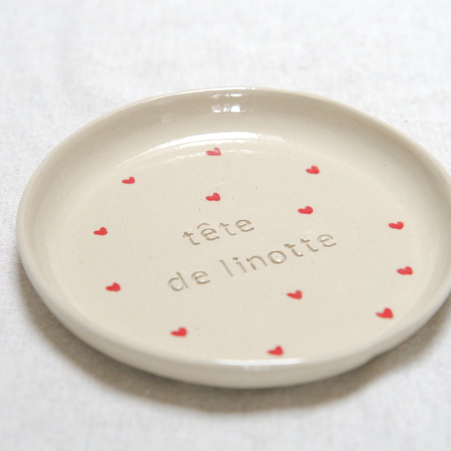 Assiette "Tête de linotte"